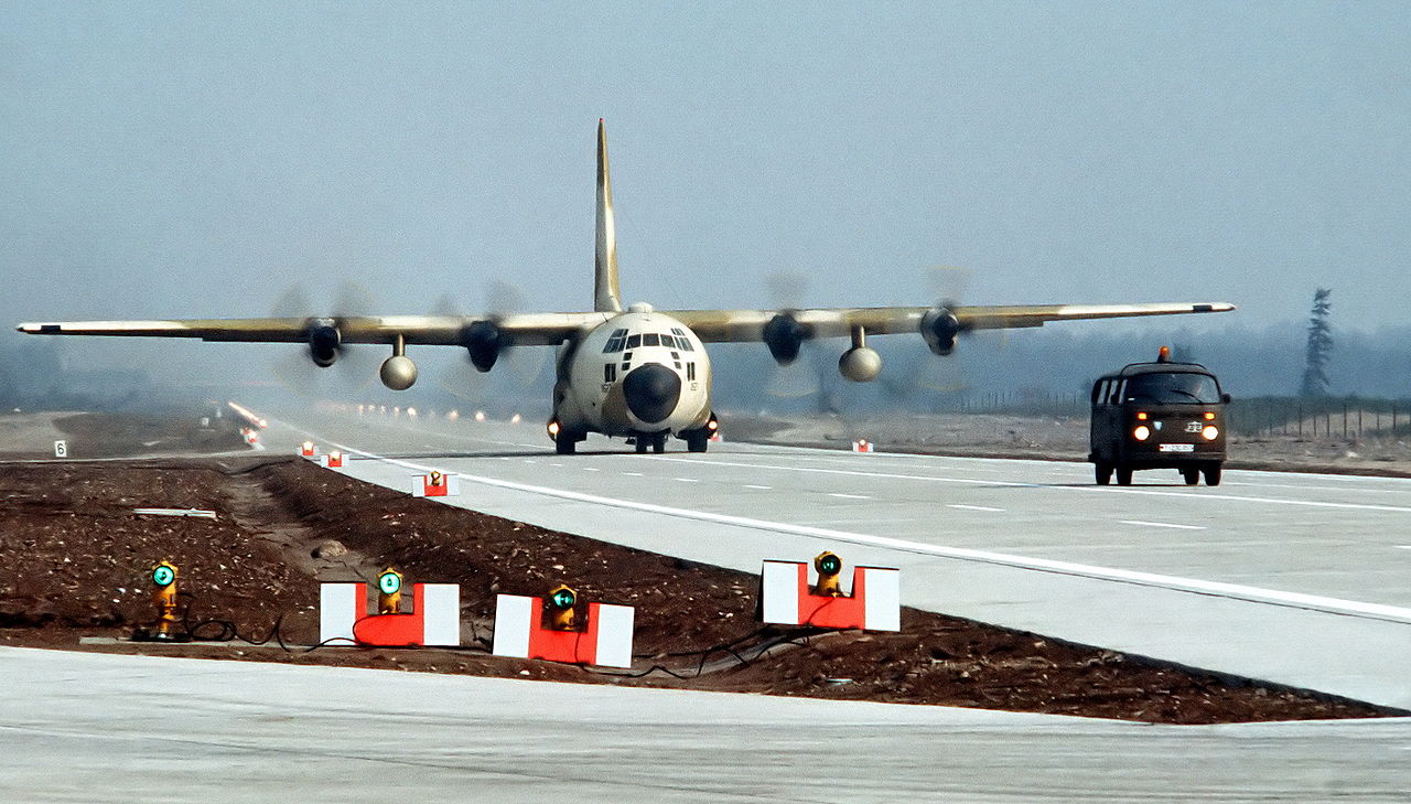 C130 taxying on highway strip