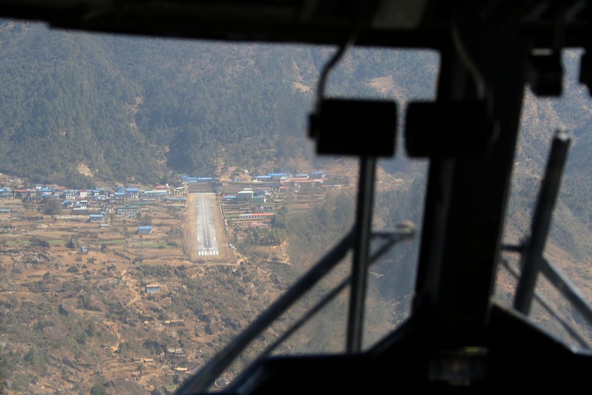 View of Lukla (Tenzing-Hillary) airport from the flight deck of a DHC-6 on approach [Source: wikicommons, Author: Reinhard Kraasch, Feb 2006]